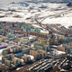 Illustration for article titled Worlds northernmost big city is a brutal mosaic of color and pollution